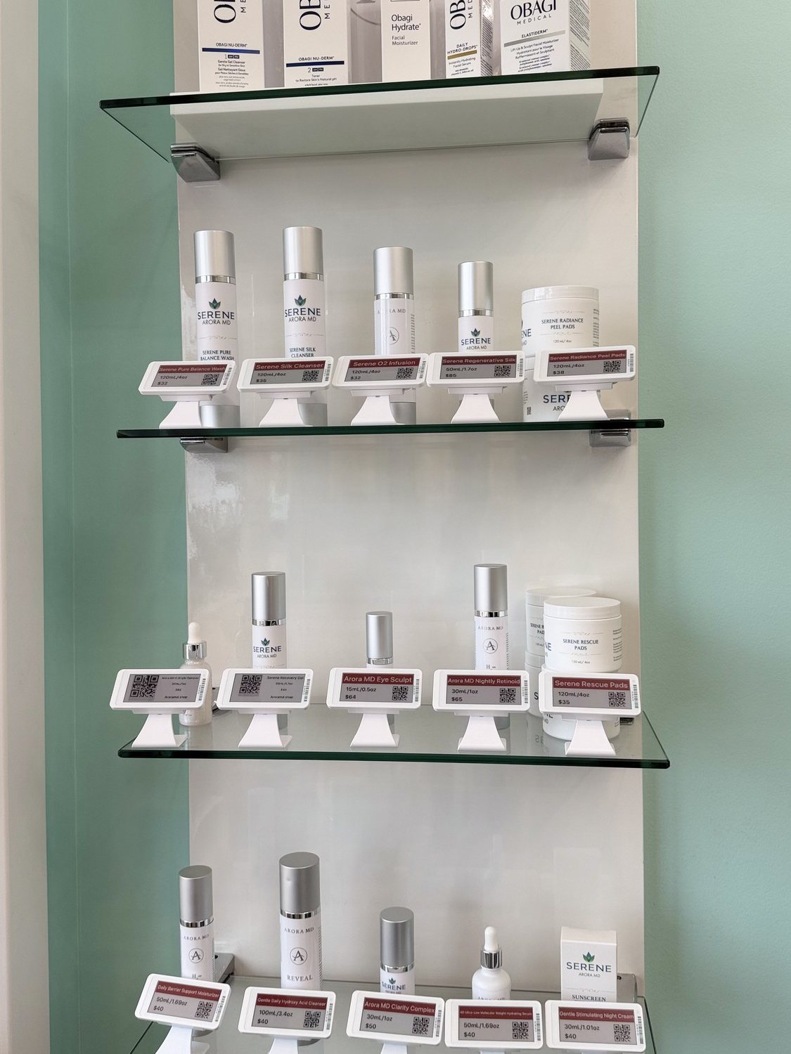 Medical-grade skincare retail wall at Serene Med Spa Hudson